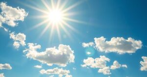 Clear skies with bright sunshine and a vibrant blue backdrop, depicting a hot summer day in the Inland Northwest.