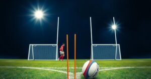 England rugby team preparing for a match, showcasing teamwork and sportsmanship under stadium lights.